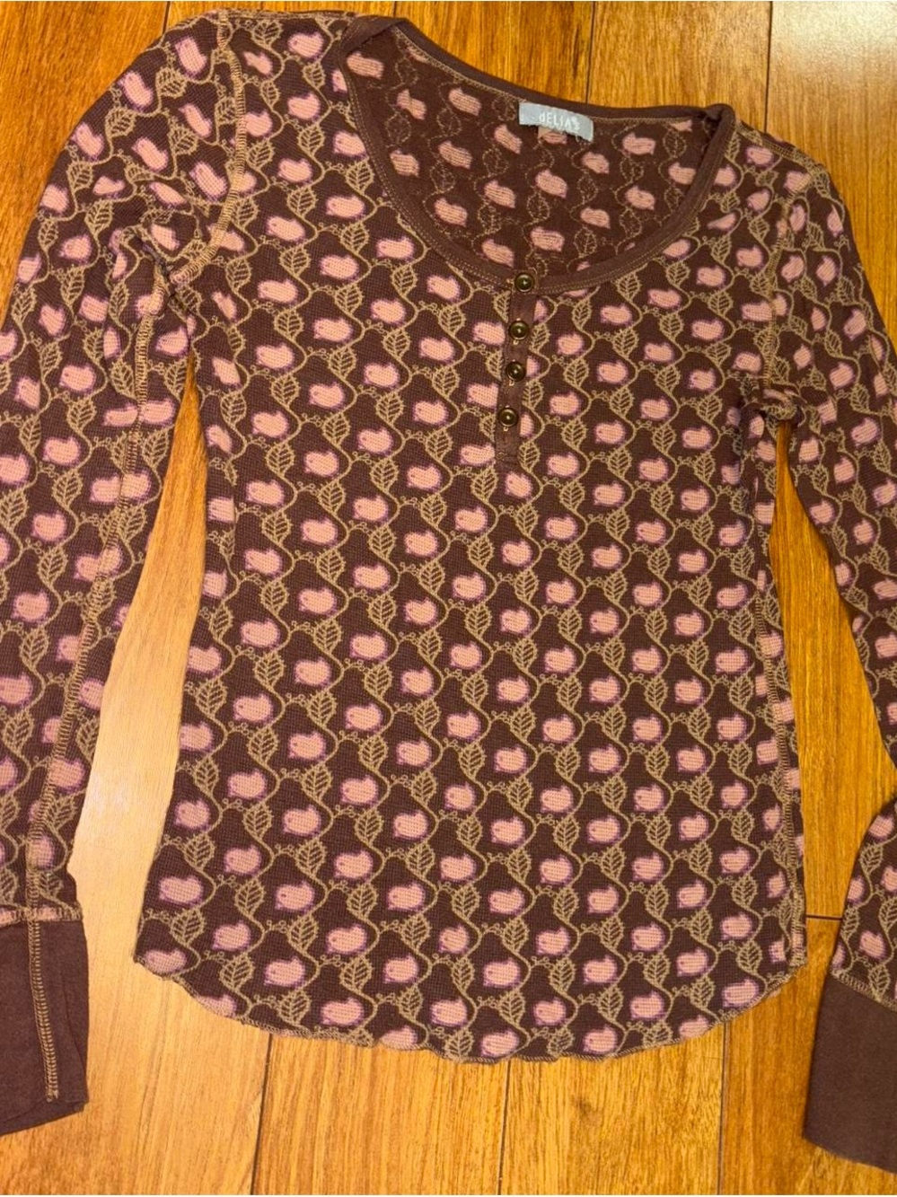 dELiA*s Brown Long-Sleeve Henley Top with Pink Floral Motif